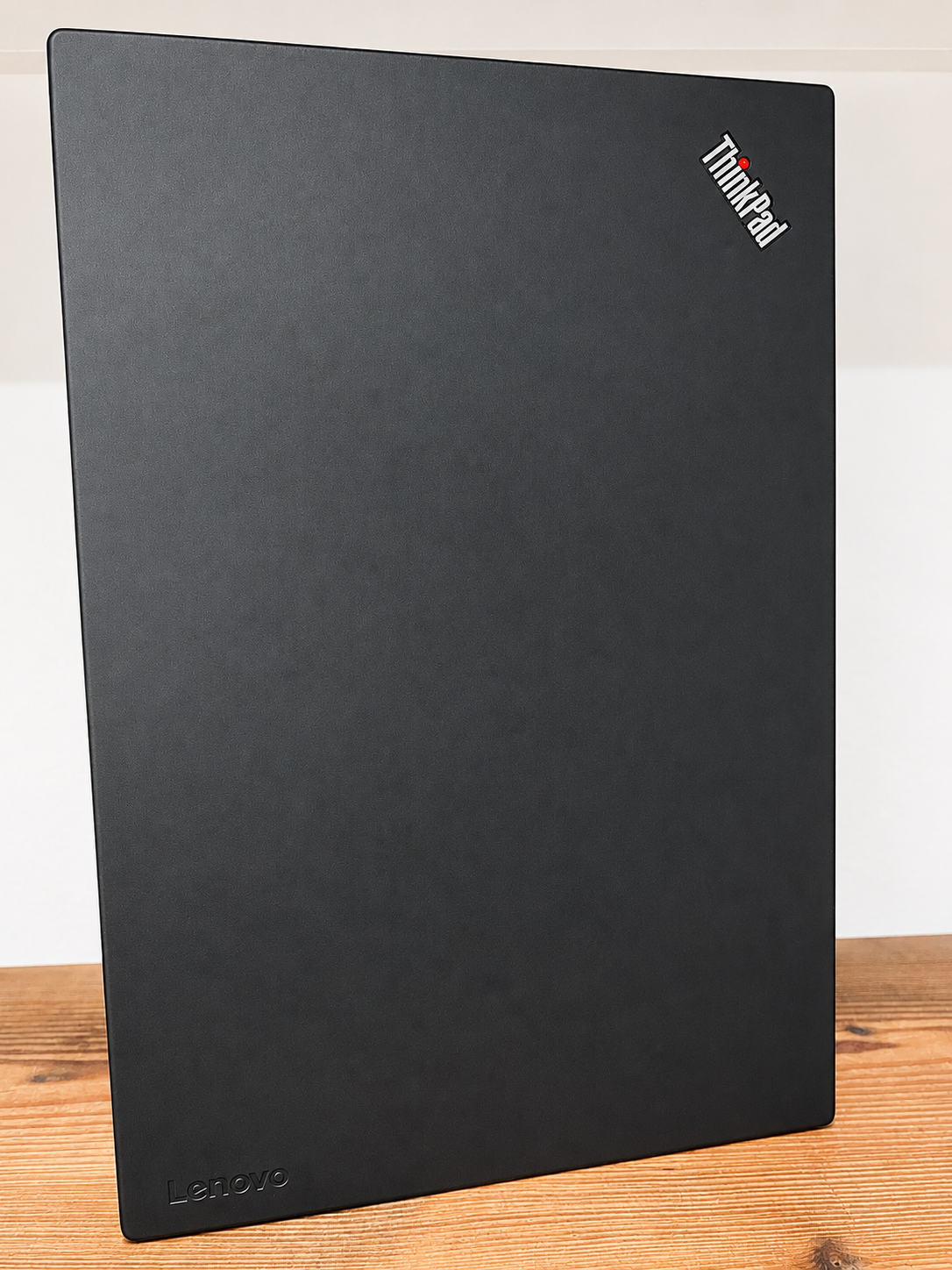 A closed ThinkPad lid before the rebuild.